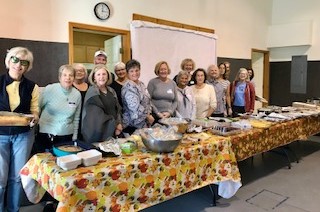 This amazing group of Ruthie’s Kitchen volunteers served a Thanksgiving Feast on November 12. Look at all the food! Ninety meals were served.